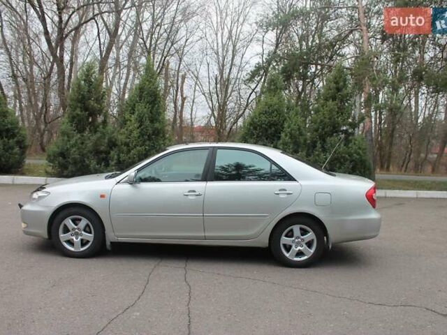 Серый Тойота Камри, объемом двигателя 2.4 л и пробегом 375 тыс. км за 5500 $, фото 7 на Automoto.ua