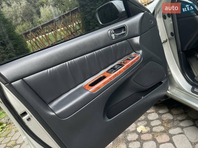 Серый Тойота Камри, объемом двигателя 3 л и пробегом 240 тыс. км за 6250 $, фото 19 на Automoto.ua