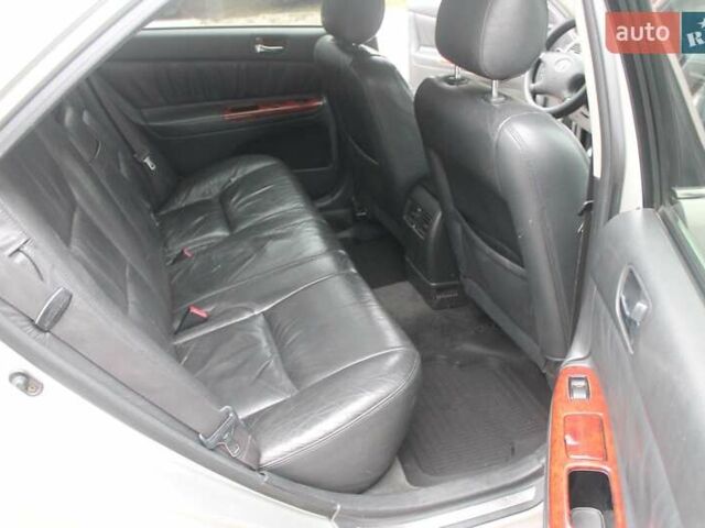 Серый Тойота Камри, объемом двигателя 2.4 л и пробегом 375 тыс. км за 5500 $, фото 13 на Automoto.ua