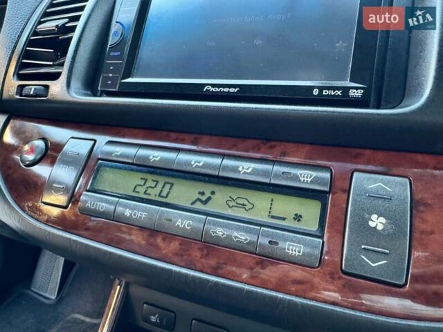 Серый Тойота Камри, объемом двигателя 2.4 л и пробегом 257 тыс. км за 5400 $, фото 30 на Automoto.ua