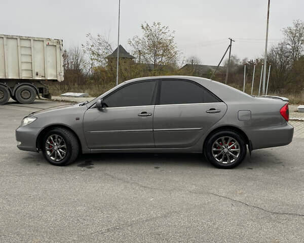 Сірий Тойота Камрі, об'ємом двигуна 3 л та пробігом 384 тис. км за 5500 $, фото 12 на Automoto.ua