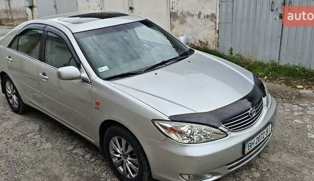 Серый Тойота Камри, объемом двигателя 2.36 л и пробегом 260 тыс. км за 6500 $, фото 11 на Automoto.ua