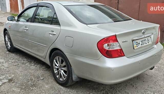 Серый Тойота Камри, объемом двигателя 2.36 л и пробегом 260 тыс. км за 6500 $, фото 5 на Automoto.ua