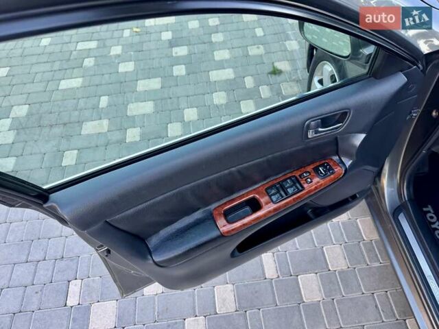 Серый Тойота Камри, объемом двигателя 2.4 л и пробегом 257 тыс. км за 5400 $, фото 68 на Automoto.ua