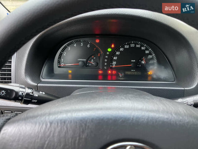 Серый Тойота Камри, объемом двигателя 3 л и пробегом 229 тыс. км за 7000 $, фото 10 на Automoto.ua