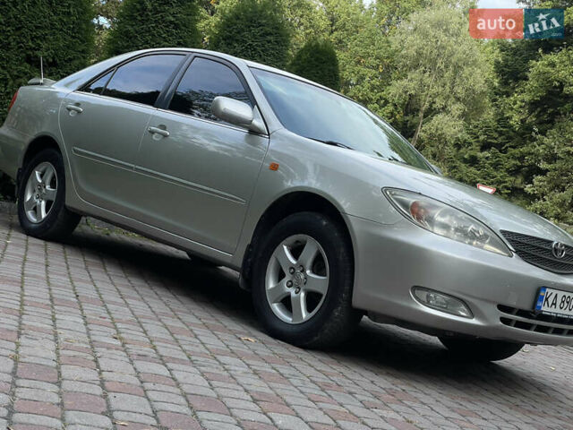 Серый Тойота Камри, объемом двигателя 3 л и пробегом 240 тыс. км за 6250 $, фото 11 на Automoto.ua