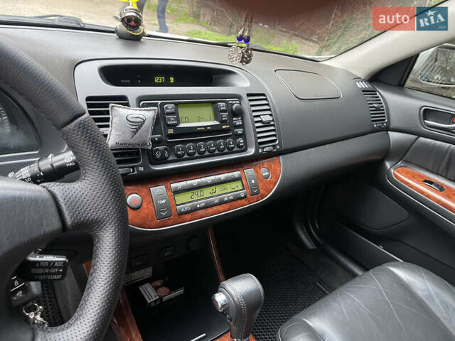 Серый Тойота Камри, объемом двигателя 3 л и пробегом 229 тыс. км за 7000 $, фото 8 на Automoto.ua