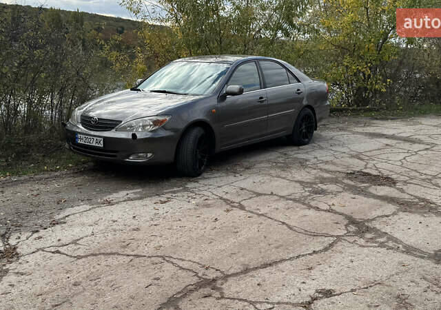 Серый Тойота Камри, объемом двигателя 3 л и пробегом 417 тыс. км за 8000 $, фото 5 на Automoto.ua