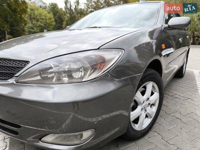 Сірий Тойота Камрі, об'ємом двигуна 3 л та пробігом 284 тис. км за 5700 $, фото 21 на Automoto.ua