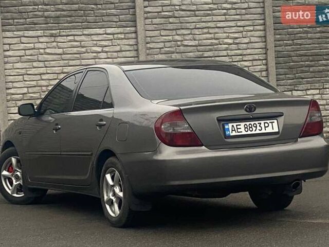 Серый Тойота Камри, объемом двигателя 2.4 л и пробегом 270 тыс. км за 5600 $, фото 6 на Automoto.ua