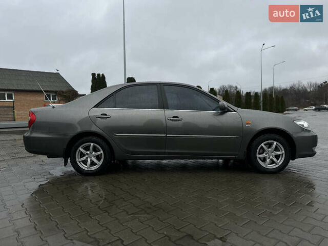 Серый Тойота Камри, объемом двигателя 2.36 л и пробегом 617 тыс. км за 5700 $, фото 7 на Automoto.ua