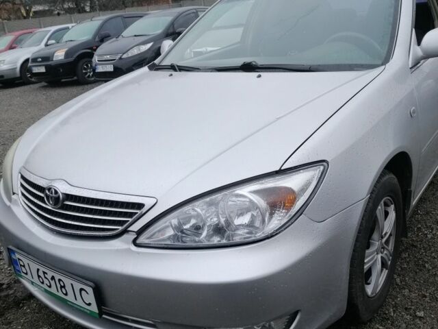 Серый Тойота Камри, объемом двигателя 2.4 л и пробегом 280 тыс. км за 4850 $, фото 9 на Automoto.ua