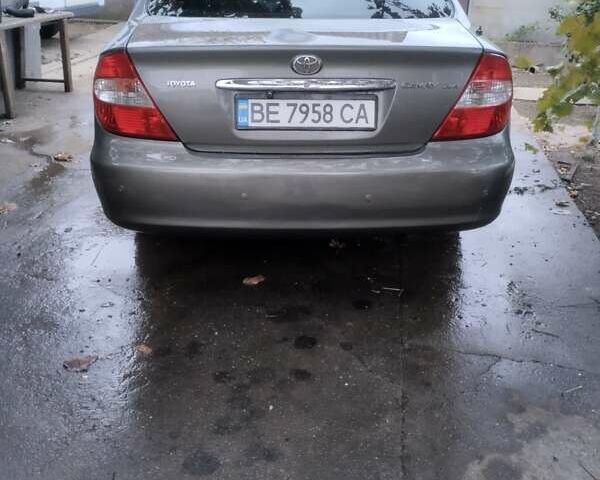 Серый Тойота Камри, объемом двигателя 2.4 л и пробегом 250 тыс. км за 4500 $, фото 9 на Automoto.ua