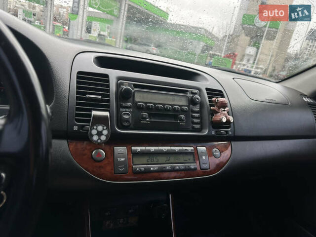 Серый Тойота Камри, объемом двигателя 2.36 л и пробегом 617 тыс. км за 5700 $, фото 13 на Automoto.ua