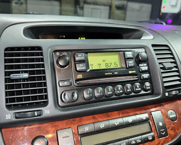 Серый Тойота Камри, объемом двигателя 2.4 л и пробегом 101 тыс. км за 7500 $, фото 15 на Automoto.ua