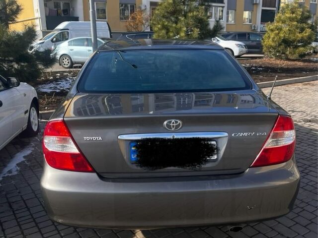 Серый Тойота Камри, объемом двигателя 2.4 л и пробегом 346 тыс. км за 5100 $, фото 5 на Automoto.ua