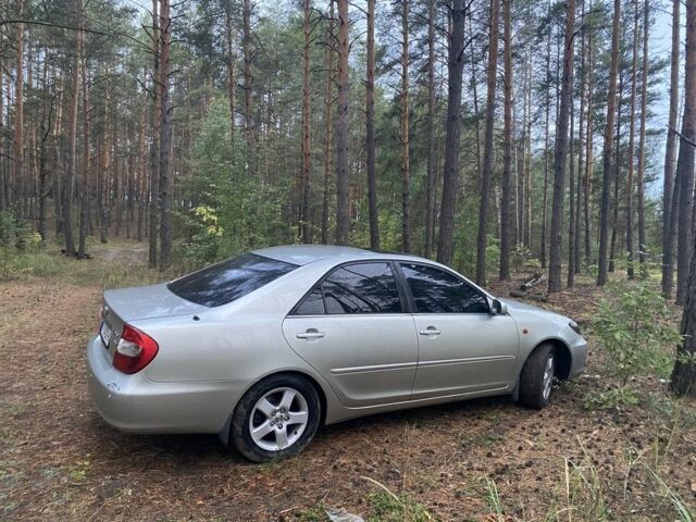 Серый Тойота Камри, объемом двигателя 3 л и пробегом 485 тыс. км за 7500 $, фото 4 на Automoto.ua