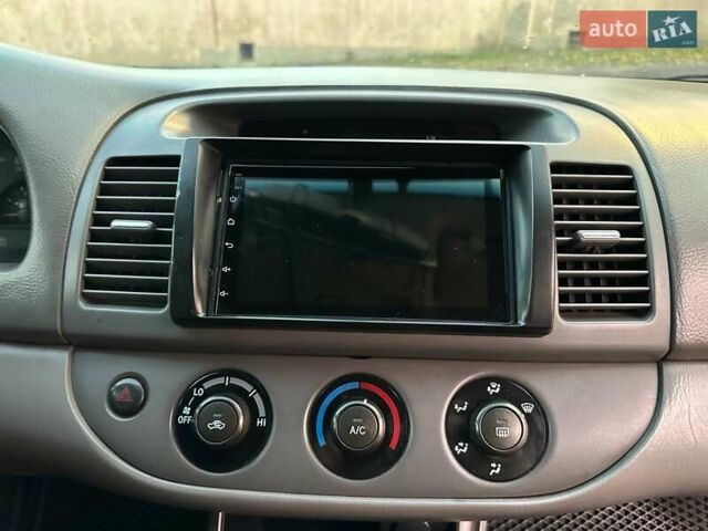 Серый Тойота Камри, объемом двигателя 2.36 л и пробегом 300 тыс. км за 5200 $, фото 24 на Automoto.ua
