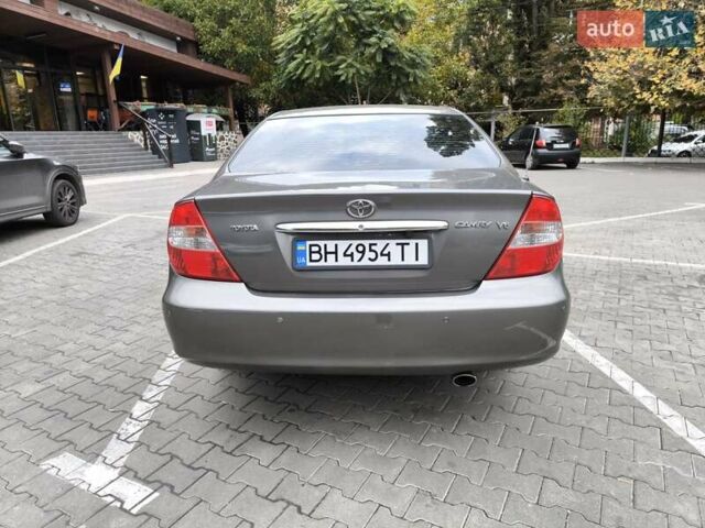 Сірий Тойота Камрі, об'ємом двигуна 3 л та пробігом 284 тис. км за 5700 $, фото 3 на Automoto.ua