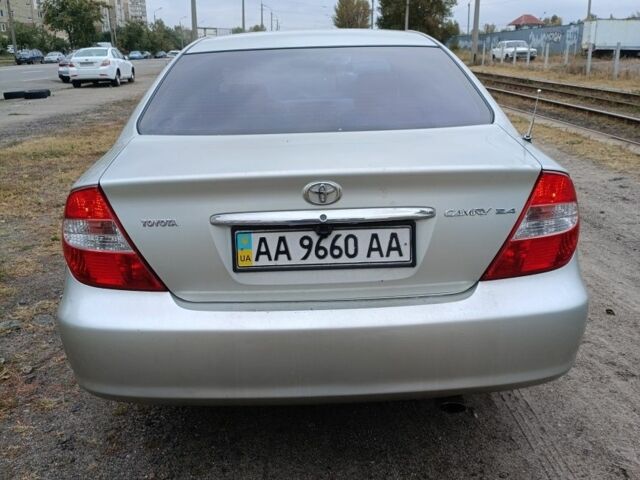 Серый Тойота Камри, объемом двигателя 2.4 л и пробегом 390 тыс. км за 5000 $, фото 7 на Automoto.ua