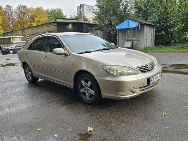 Серый Тойота Камри, объемом двигателя 3 л и пробегом 200 тыс. км за 3700 $, фото 1 на Automoto.ua