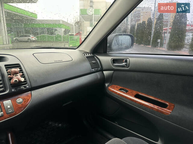 Серый Тойота Камри, объемом двигателя 2.36 л и пробегом 617 тыс. км за 5700 $, фото 15 на Automoto.ua