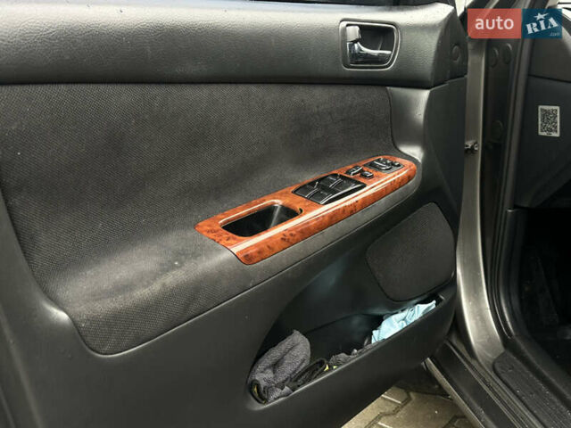 Серый Тойота Камри, объемом двигателя 2.36 л и пробегом 617 тыс. км за 5700 $, фото 11 на Automoto.ua