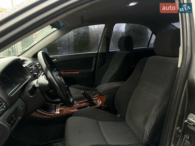 Серый Тойота Камри, объемом двигателя 2.36 л и пробегом 617 тыс. км за 5700 $, фото 16 на Automoto.ua