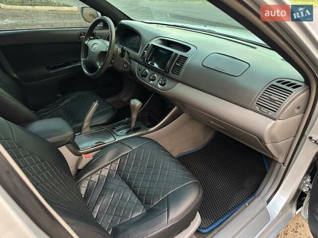 Серый Тойота Камри, объемом двигателя 2.36 л и пробегом 300 тыс. км за 5200 $, фото 22 на Automoto.ua