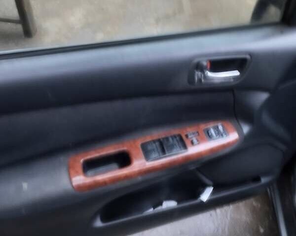 Серый Тойота Камри, объемом двигателя 2.4 л и пробегом 250 тыс. км за 4500 $, фото 4 на Automoto.ua