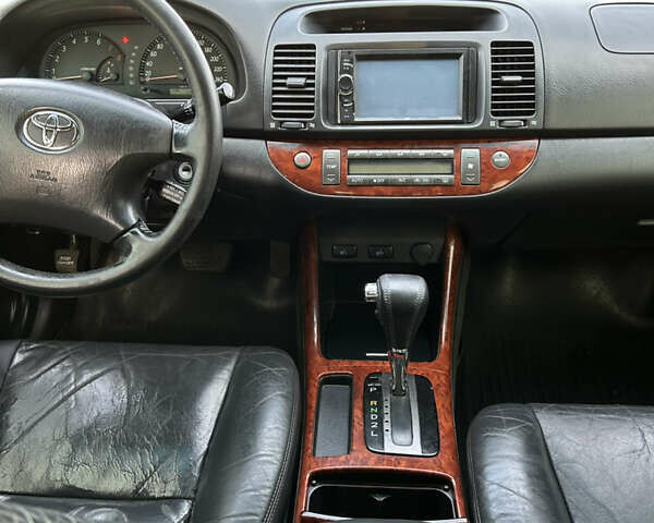 Серый Тойота Камри, объемом двигателя 3 л и пробегом 255 тыс. км за 6800 $, фото 12 на Automoto.ua