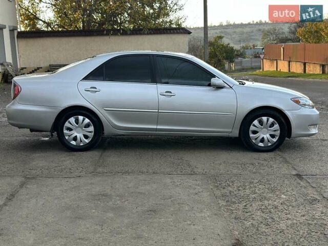 Серый Тойота Камри, объемом двигателя 2.36 л и пробегом 300 тыс. км за 5200 $, фото 7 на Automoto.ua