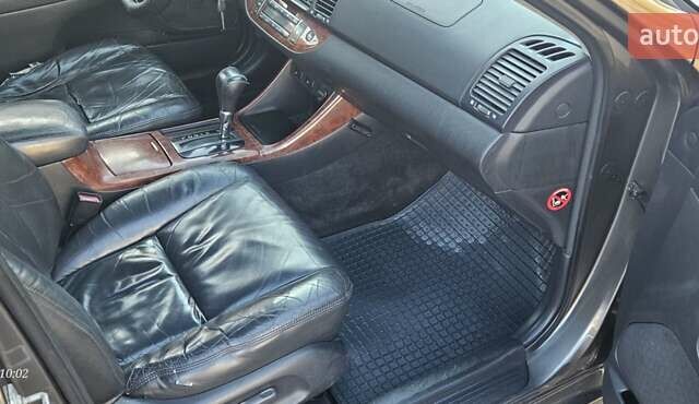 Серый Тойота Камри, объемом двигателя 3 л и пробегом 210 тыс. км за 4800 $, фото 4 на Automoto.ua