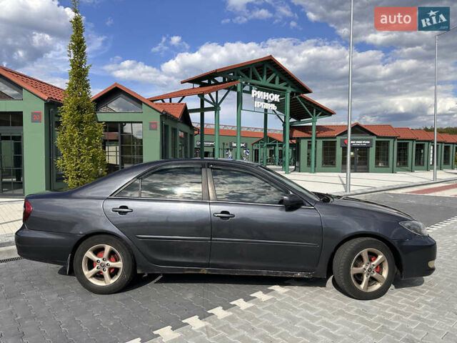 Серый Тойота Камри, объемом двигателя 2.4 л и пробегом 348 тыс. км за 5200 $, фото 6 на Automoto.ua