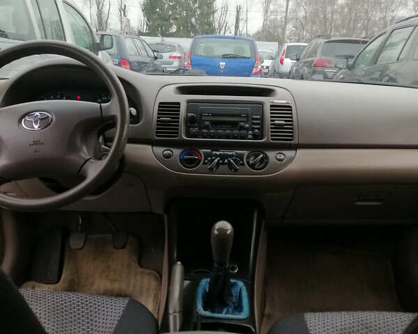 Серый Тойота Камри, объемом двигателя 2.4 л и пробегом 280 тыс. км за 4850 $, фото 19 на Automoto.ua