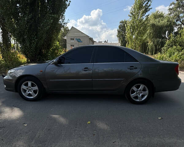 Серый Тойота Камри, объемом двигателя 3 л и пробегом 390 тыс. км за 6200 $, фото 4 на Automoto.ua