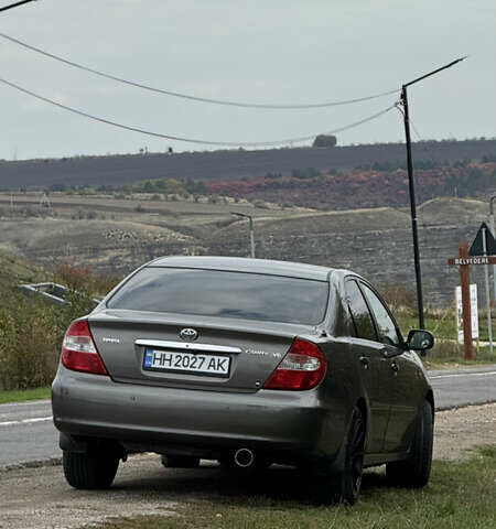 Серый Тойота Камри, объемом двигателя 3 л и пробегом 417 тыс. км за 8000 $, фото 3 на Automoto.ua