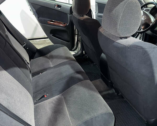 Серый Тойота Камри, объемом двигателя 2.4 л и пробегом 101 тыс. км за 7500 $, фото 10 на Automoto.ua