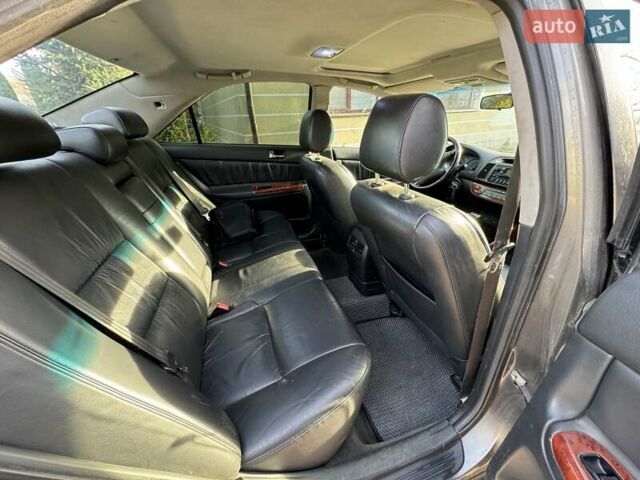 Серый Тойота Камри, объемом двигателя 3 л и пробегом 383 тыс. км за 5900 $, фото 12 на Automoto.ua