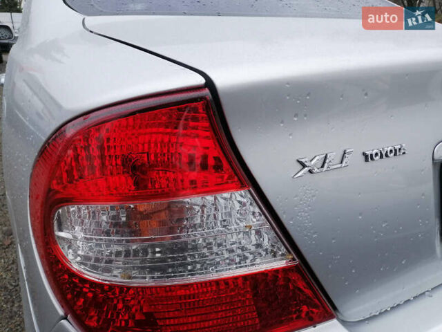 Серый Тойота Камри, объемом двигателя 2.4 л и пробегом 280 тыс. км за 4850 $, фото 10 на Automoto.ua