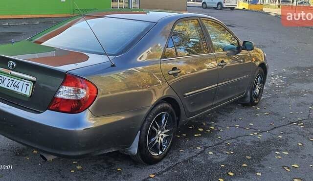 Серый Тойота Камри, объемом двигателя 3 л и пробегом 210 тыс. км за 4800 $, фото 6 на Automoto.ua