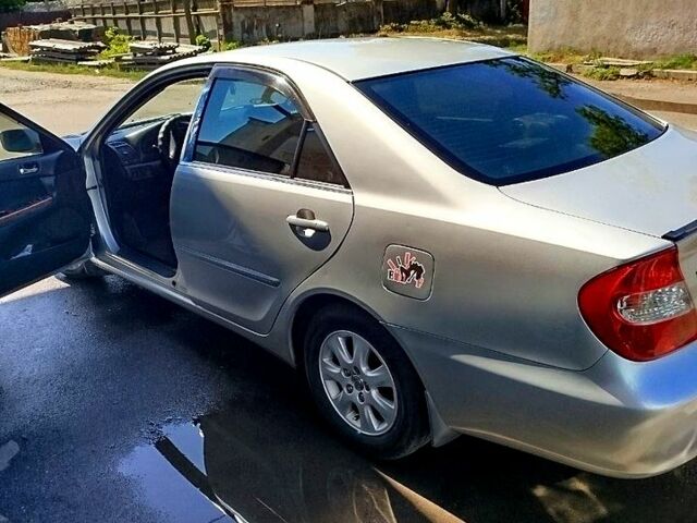 Сірий Тойота Камрі, об'ємом двигуна 2.4 л та пробігом 260 тис. км за 5500 $, фото 1 на Automoto.ua