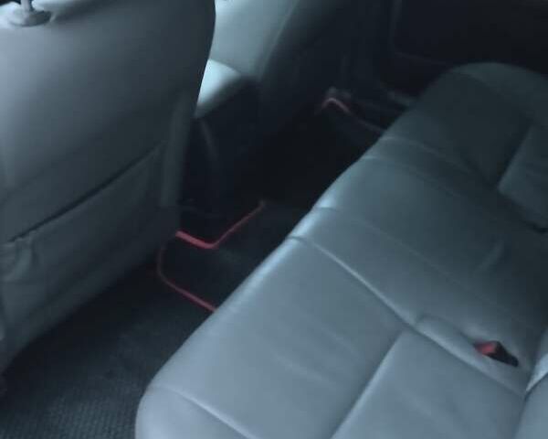 Серый Тойота Камри, объемом двигателя 2.4 л и пробегом 250 тыс. км за 4500 $, фото 1 на Automoto.ua