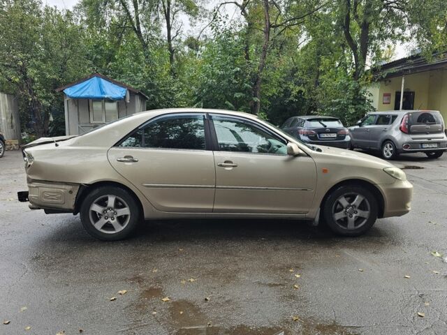 Серый Тойота Камри, объемом двигателя 3 л и пробегом 200 тыс. км за 3700 $, фото 2 на Automoto.ua