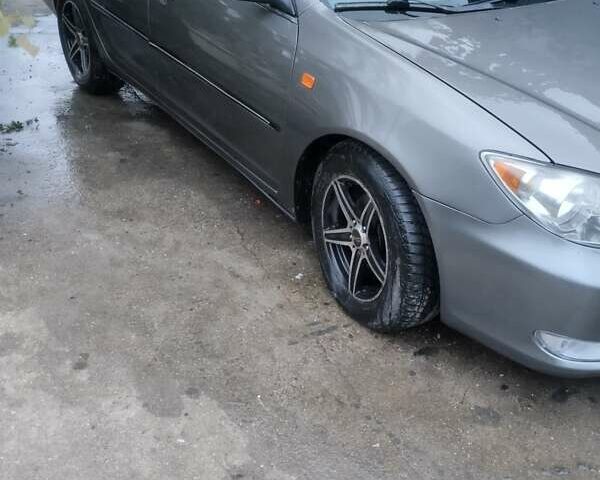 Серый Тойота Камри, объемом двигателя 2.4 л и пробегом 250 тыс. км за 4500 $, фото 10 на Automoto.ua