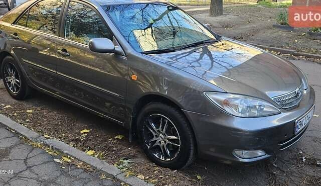 Серый Тойота Камри, объемом двигателя 3 л и пробегом 210 тыс. км за 4800 $, фото 12 на Automoto.ua