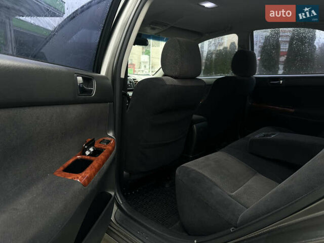 Серый Тойота Камри, объемом двигателя 2.36 л и пробегом 617 тыс. км за 5700 $, фото 17 на Automoto.ua