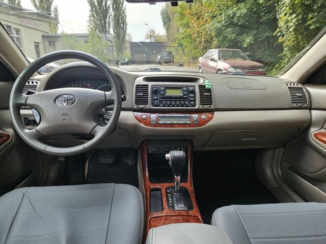 Серый Тойота Камри, объемом двигателя 3 л и пробегом 200 тыс. км за 3700 $, фото 13 на Automoto.ua