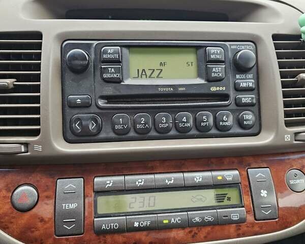 Серый Тойота Камри, объемом двигателя 3 л и пробегом 330 тыс. км за 3100 $, фото 18 на Automoto.ua