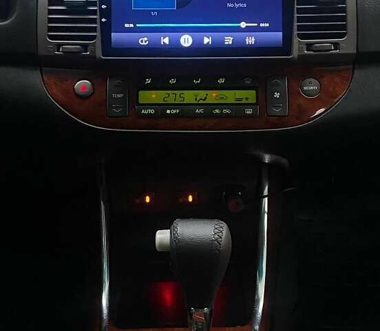 Серый Тойота Камри, объемом двигателя 2.4 л и пробегом 270 тыс. км за 5600 $, фото 11 на Automoto.ua